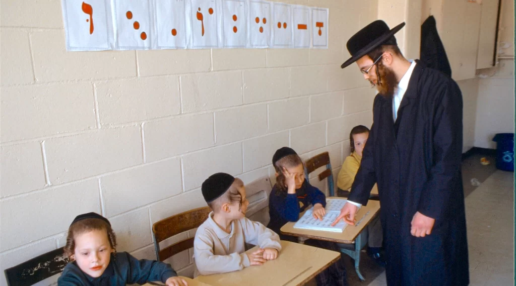 Why do Jewish communities value religious school for children?